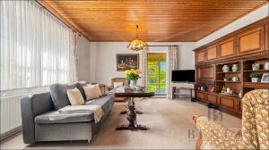 Wohnzimmer mit Zugang zur Terrasse Wohnung 2
