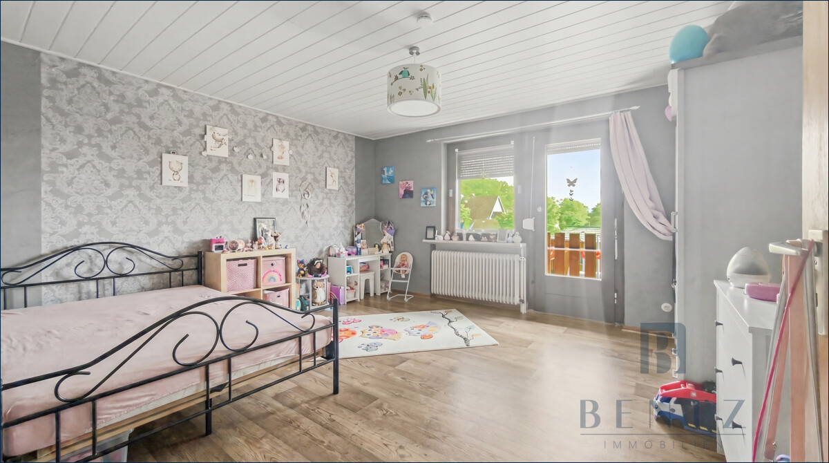 Kinderzimmer mit Balkon Dachgeschosswohnung