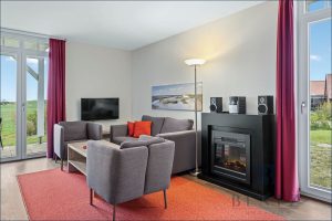 Wohnzimmer mit Kamin