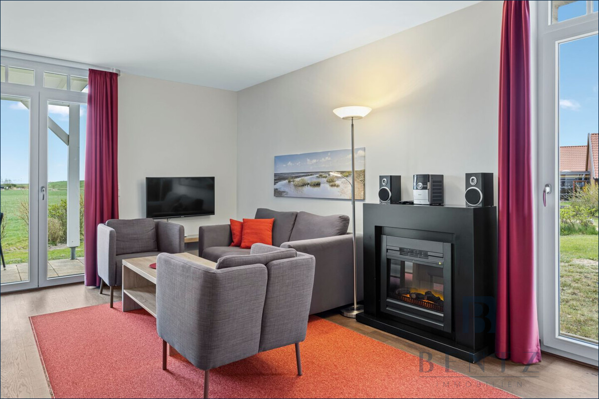 Wohnzimmer mit Kamin
