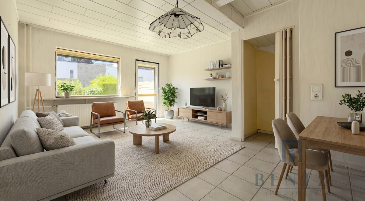 Wohnzimmer mit Zugang zur Terrasse - Einrichtungsbeispiel